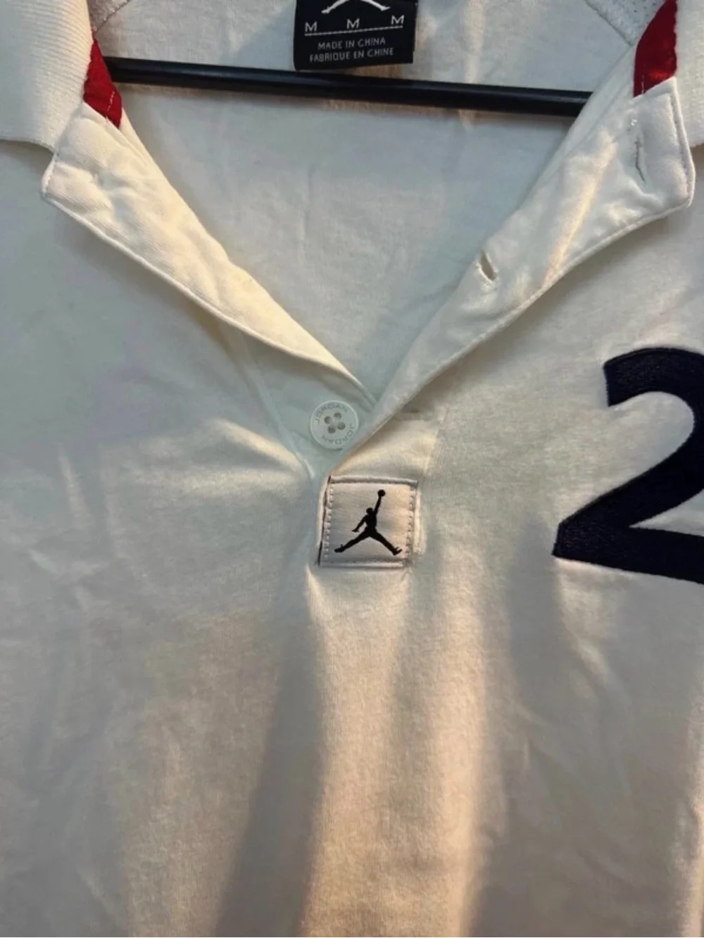 Jordan White Polo with Navy '23' and Red Accent